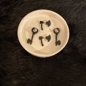 2 pairs of black axe earrings